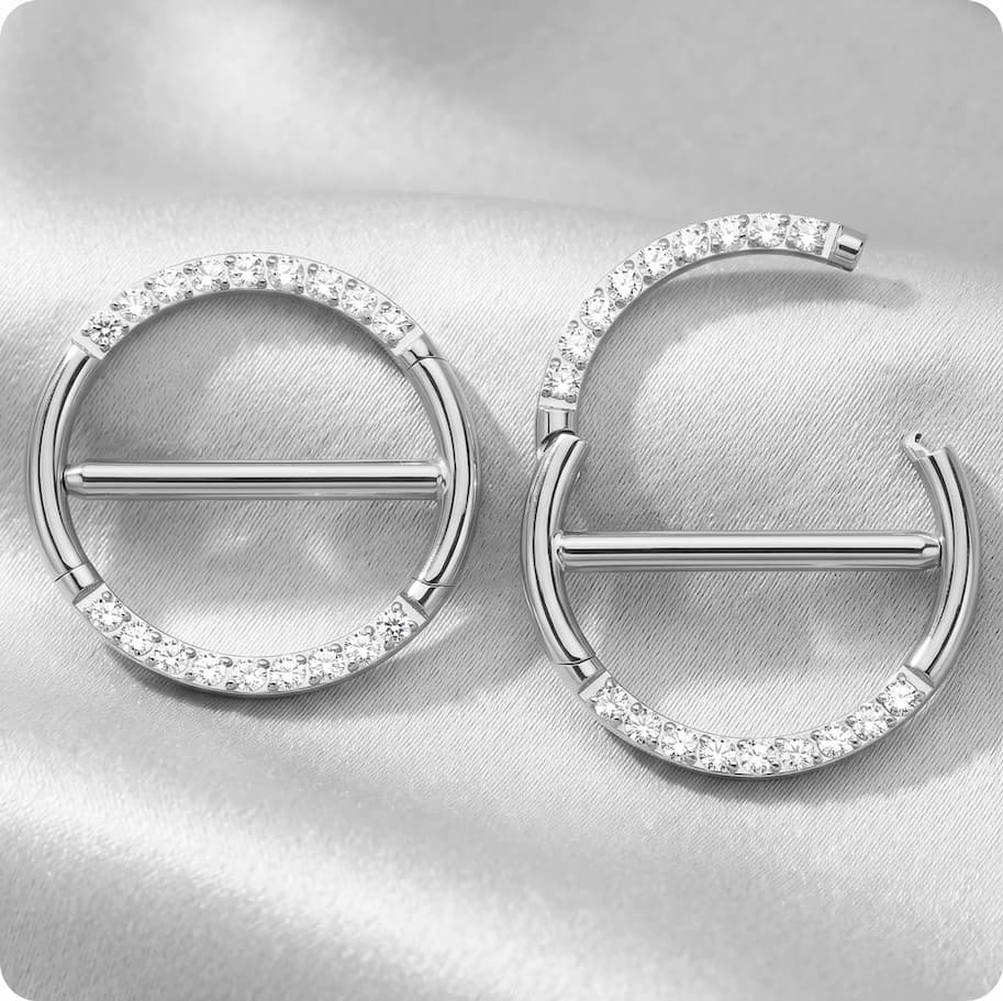 Hinged nipple clickers