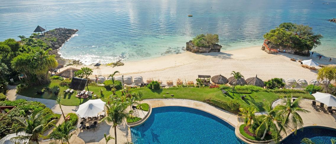 Philippines Coastal Oasis on Mactan Island with Massages, Daily Breakfast, Nightly Dinner & Drinks