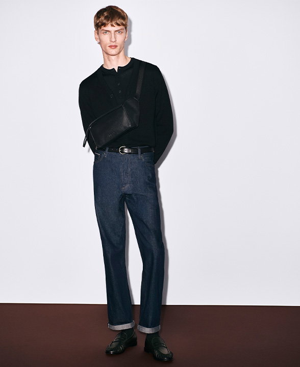 Man wearing Autograph Loose Fit Pure Cotton Japanese Selvedge Jeans in Indigo