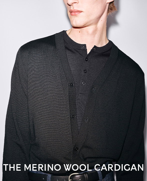 Man wearing Autograph Pure Extra Fine Merino Wool Cardigan in Black