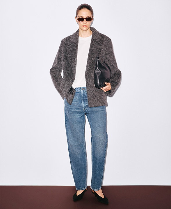 Woman wearing Dark Grey Wool Rich Brushed Tailored Jacket and Light Indigo Straight Jeans