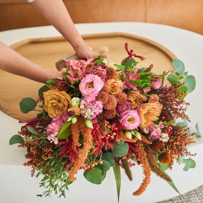 Farmgirl bouquet Fall Guy placed in living room