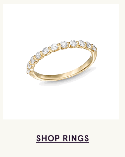 Gold ring band with round-cut continuous diamonds along front. Click here to shop rings