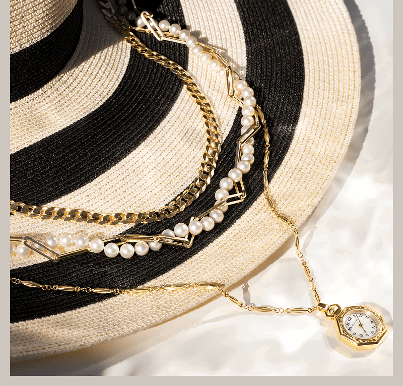 A sun hat wrapped in necklaces.