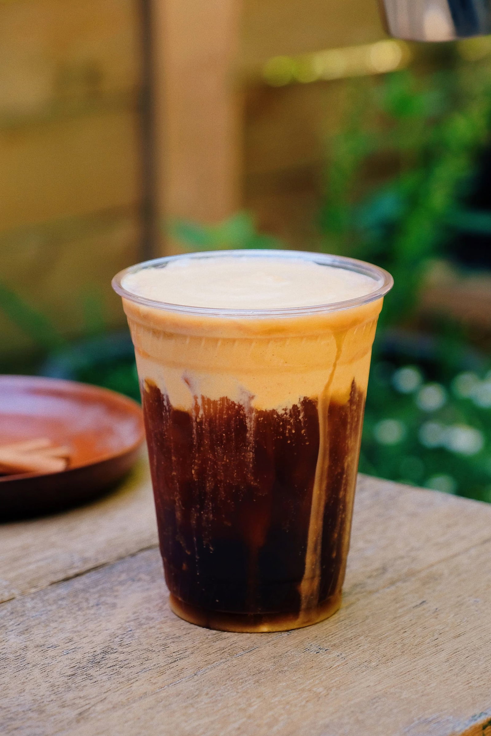 A cup of cold brew topped with Pumpkin Cold Foam