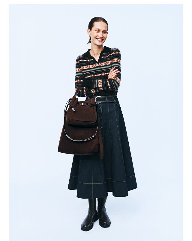 A woman wearing a put-together outfit.