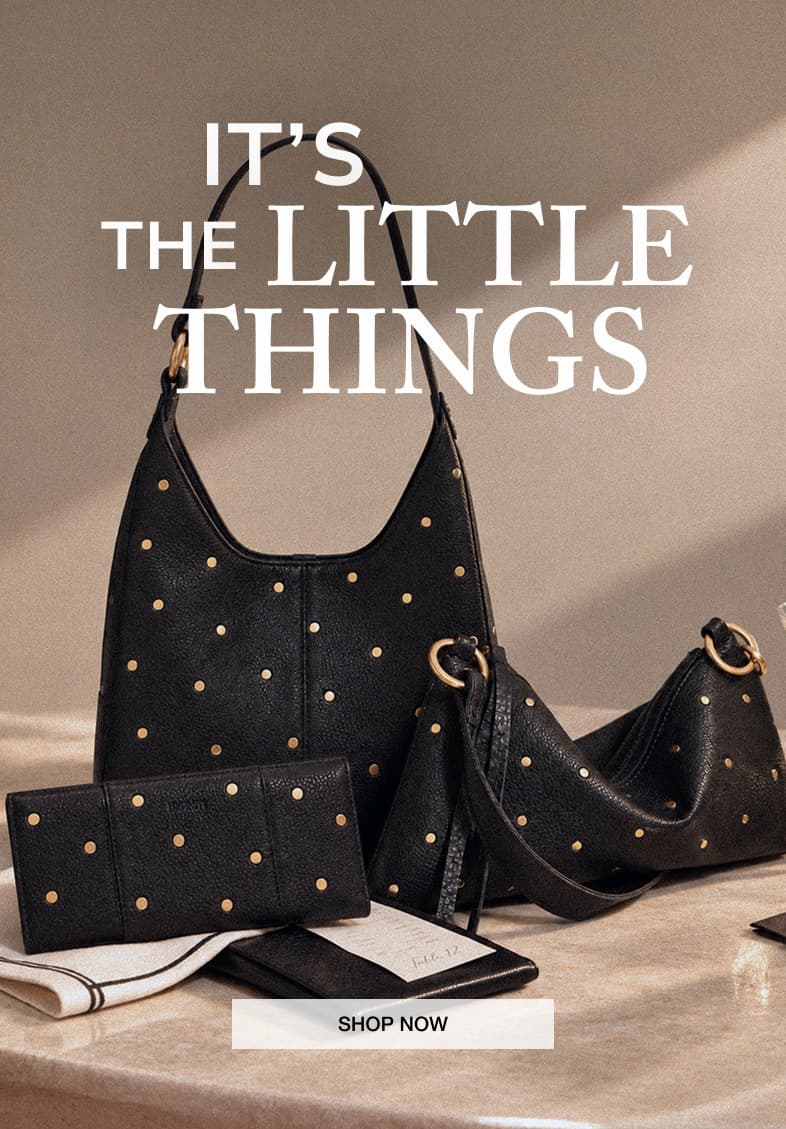 IT’S THE LITTLE THINGS. Black leather bags and accessories featuring mini brushed gold rivets. SHOP NOW.