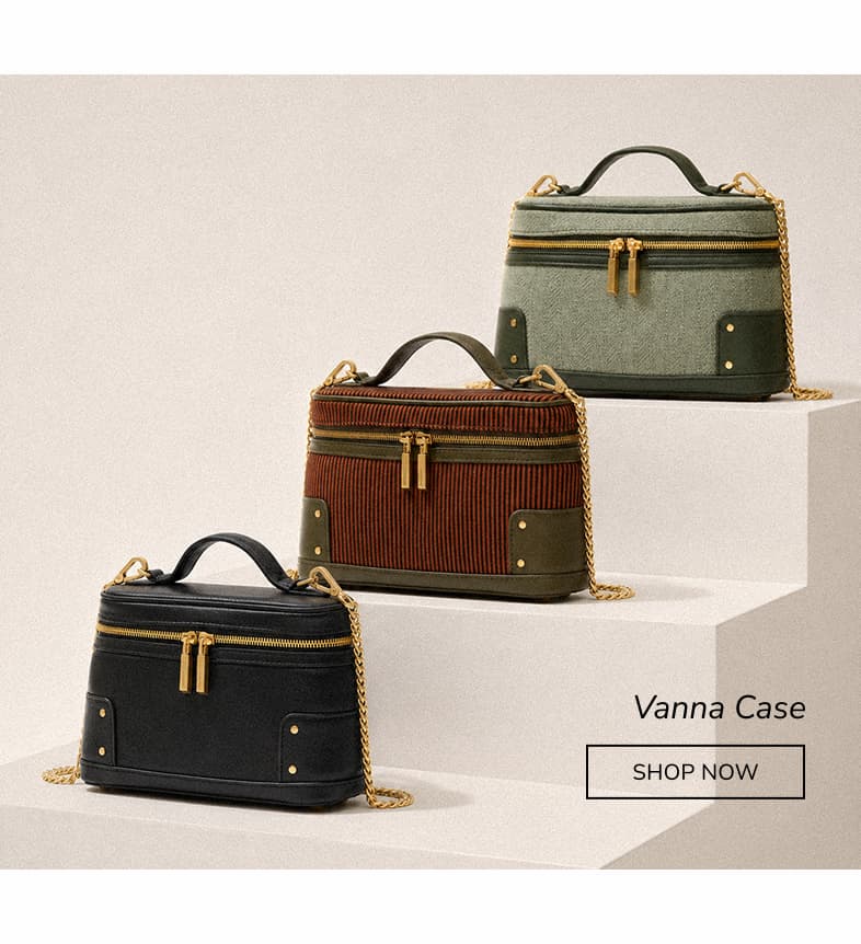 Three Vanna Cases with gold hardware and chain straps, shown in black leather, Tuscan Tandem, and green.
