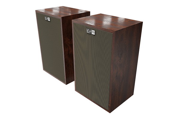 A pair of Klipsch Rebellion in Tigerwood finish on white.