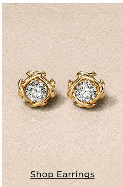 A pair of Unspoken stud earrings. Click to Shop Earrings
