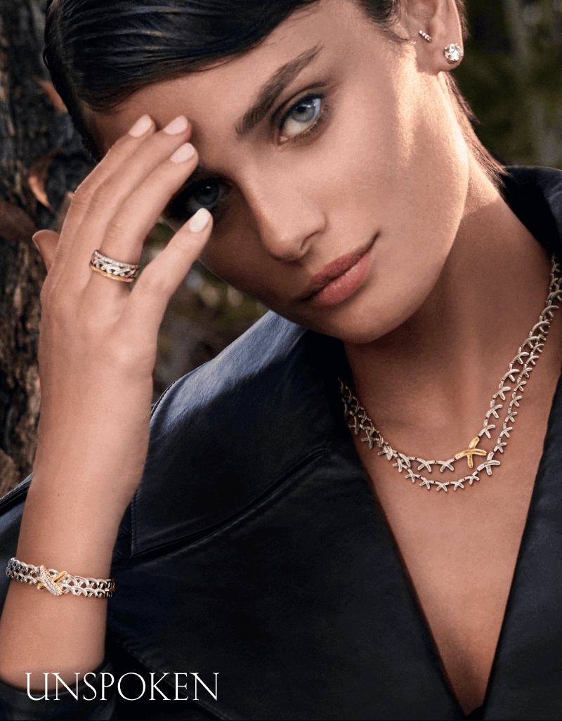 Model Taylor Hill wearing a matching ring, bracelet, and necklace from the Unspoken collection.