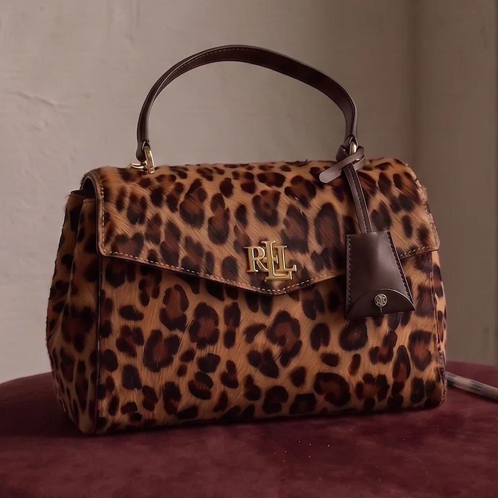 Lauren Ralph Lauren Farrah Leopard Print Haircalf Small Soft Satchel Bag, $375 Online & select stores.