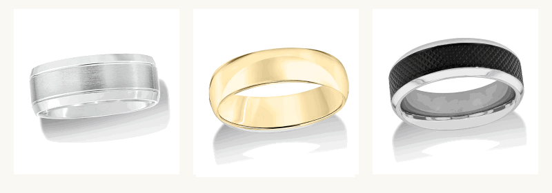 Side-by-side men’s silver band with bevelled edges, gold band & silver band with black inlaid pattern.