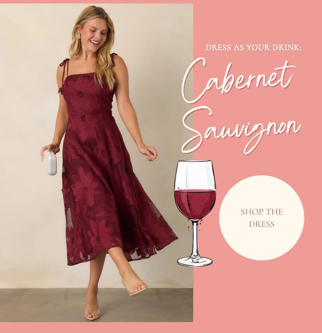 Model wearing a Burgundy Floral Lace Tie Strap Midi Dress. Shop the Dress.