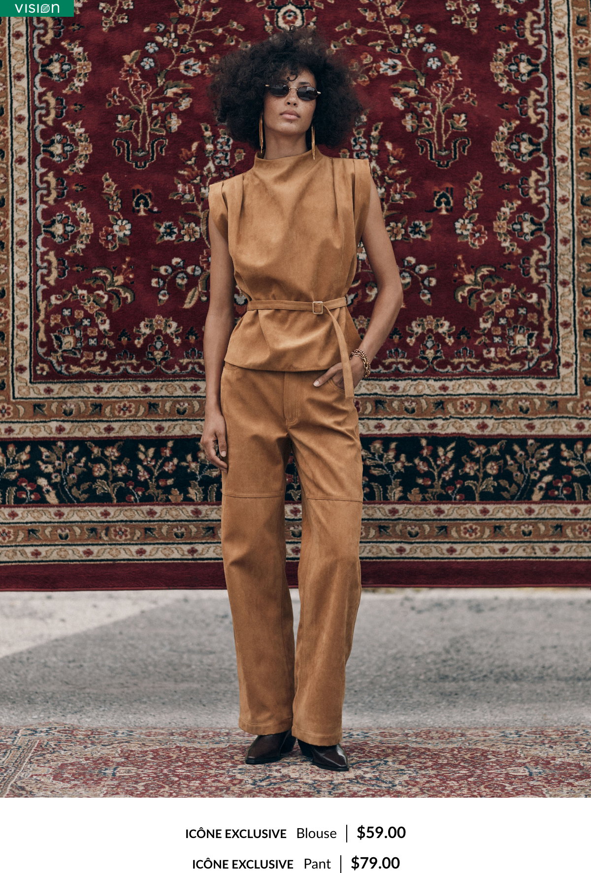 Woman wearing a matching faux suede set. The sleeveless belted blouse costs $59. The wide-leg pants cost $79.