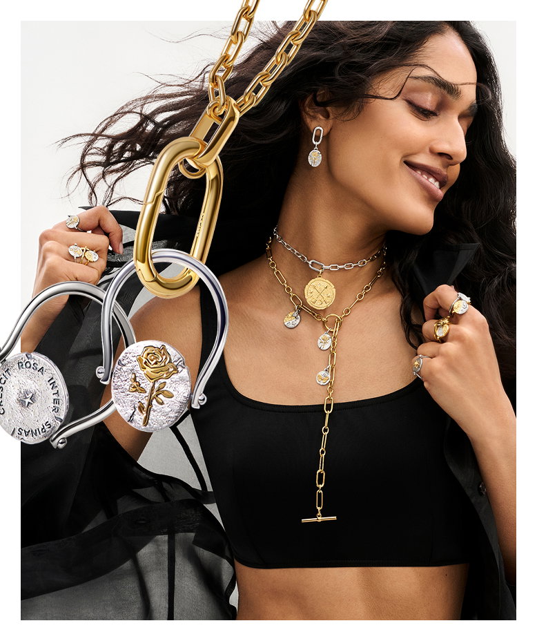A model styles Pandora ME chain and Pandora Talisman medallions.