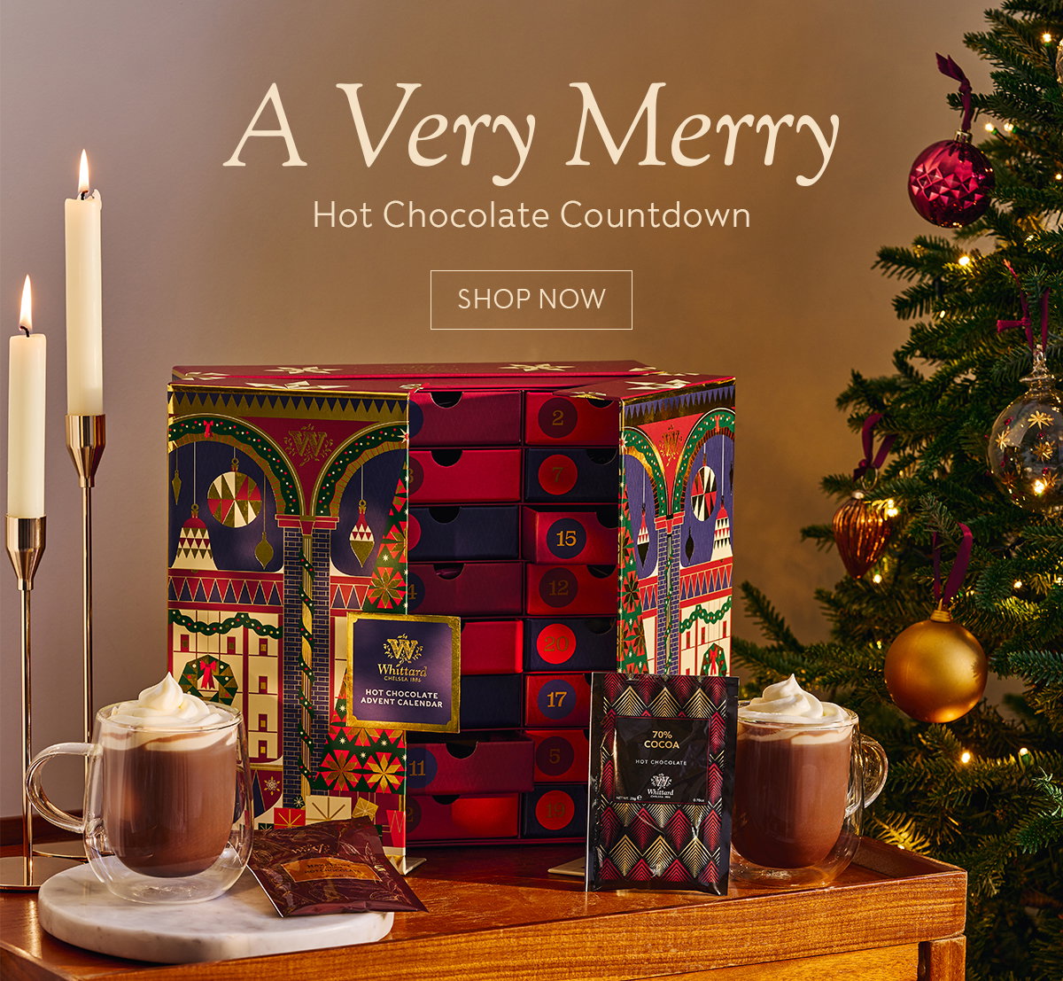 Image of hot chocolate advent calendar, with made up drinks and sachets, with 'A Very Merry Hot Chocolate Countdown' and a shop now CTA