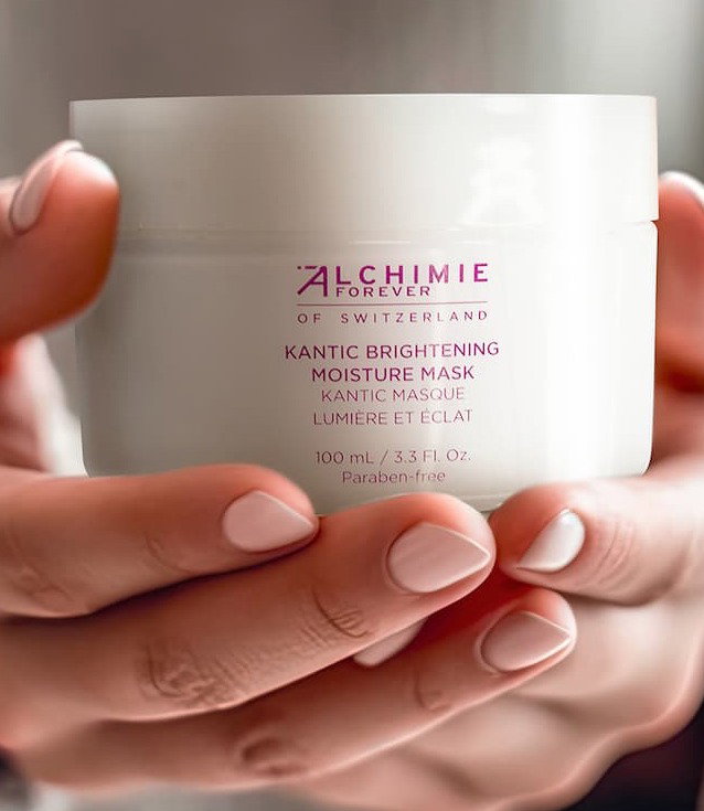 An image of two hands holding a jar of Kantic® Brightening Moisture Mask.