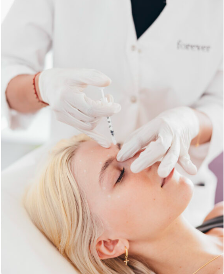 An image of a woman receiving treatment.