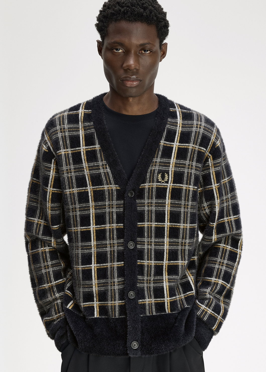 Only At Fred Perry: male model wearing a Fred Perry Tartan Cardigan