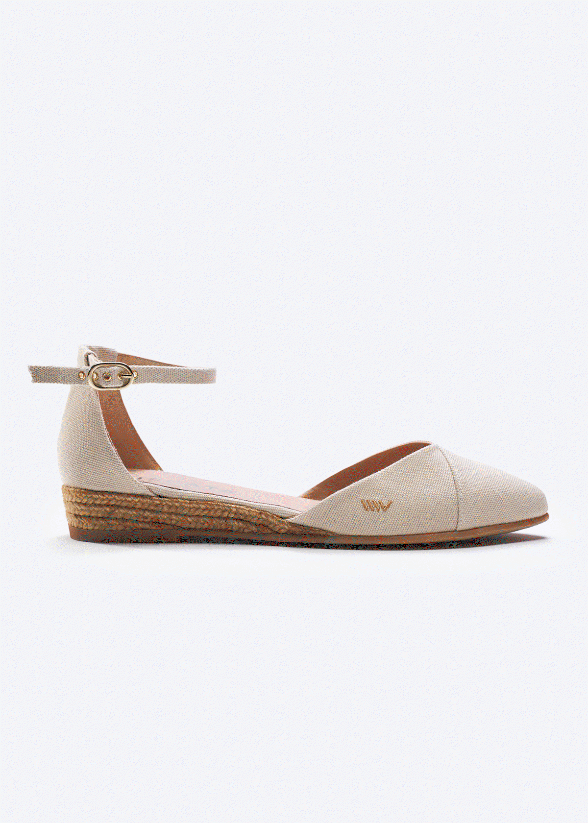 Variety of Montroig canvas espadrilles with an ankle strap from Viscata and a low jute wedge sole.