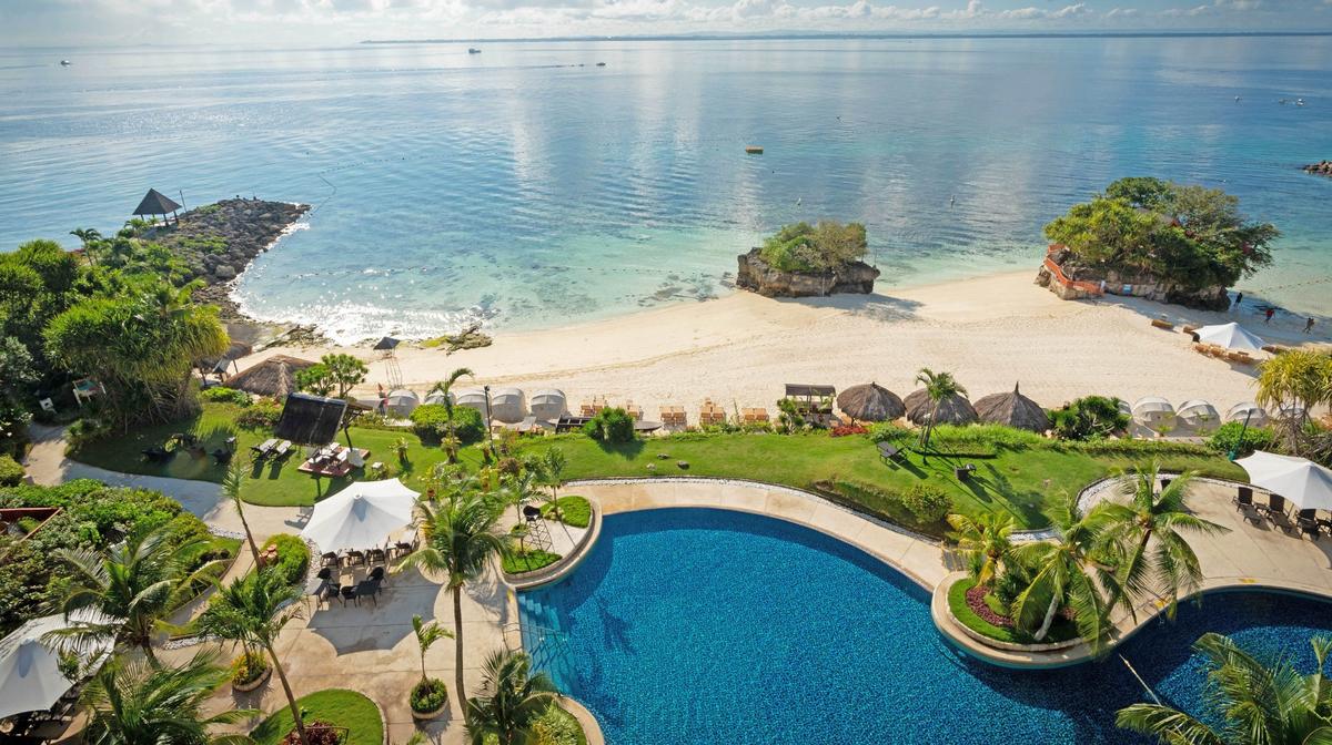 Philippines Coastal Oasis on Mactan Island with Massages, Daily Breakfast, Nightly Dinner & Drinks