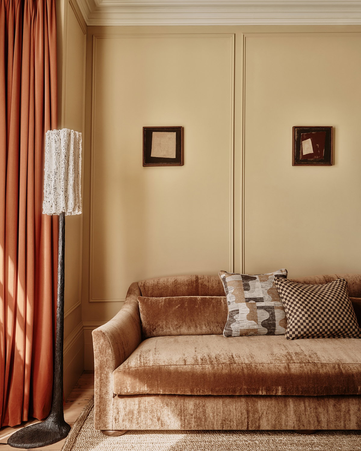 Contemporary living room featuring Hay panelled walls, a Wimborne White ceiling and warm wood furnishings.