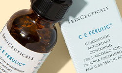 SkinCeuticals C E Ferulic bottle propped on product box