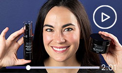 LovelySkin employee holding up the new Revision Skincare products