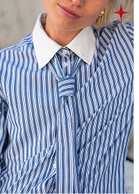 close up of striped button up shirt with tie