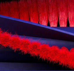 Close-up of the brush bar of the Dyson R1 Nurovi robot vacuum cleaner.