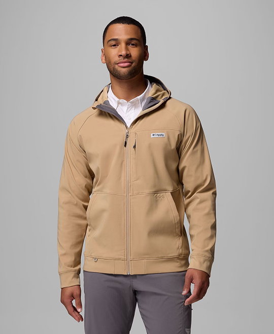A man wearing a tan hoodie.
