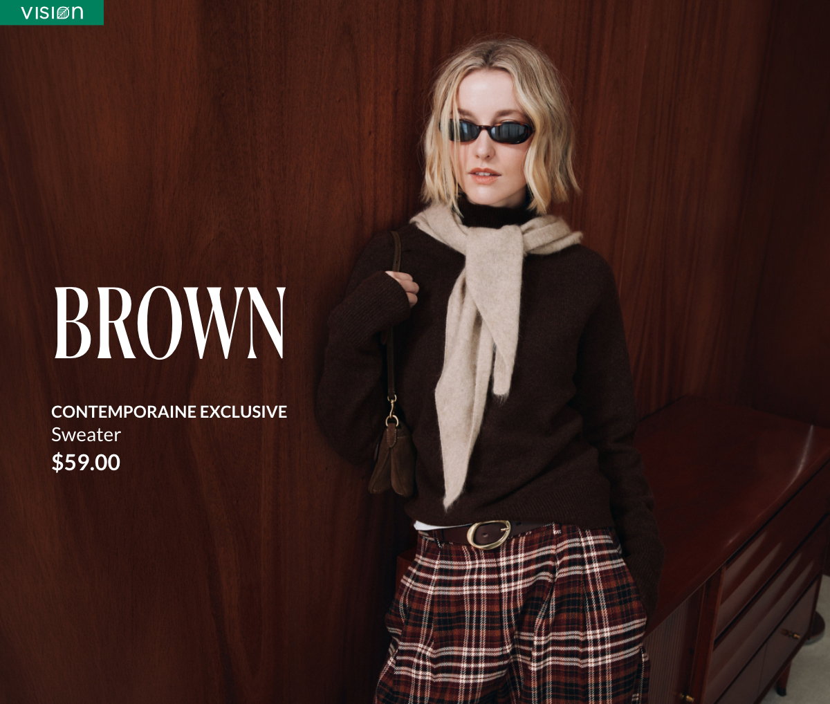 Woman wearing a loose-fitting brown mock-neck sweater priced at $59