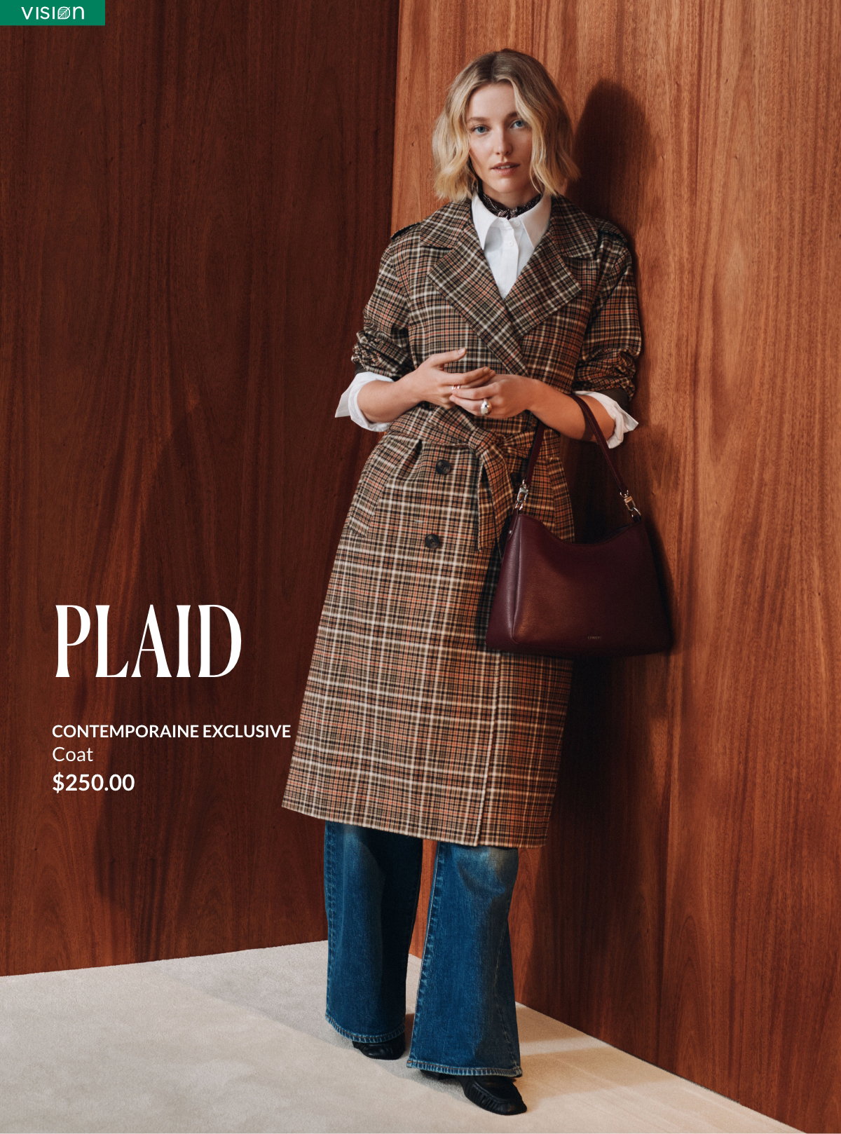 Woman wearing a brown and orange plaid trench coat priced at $250