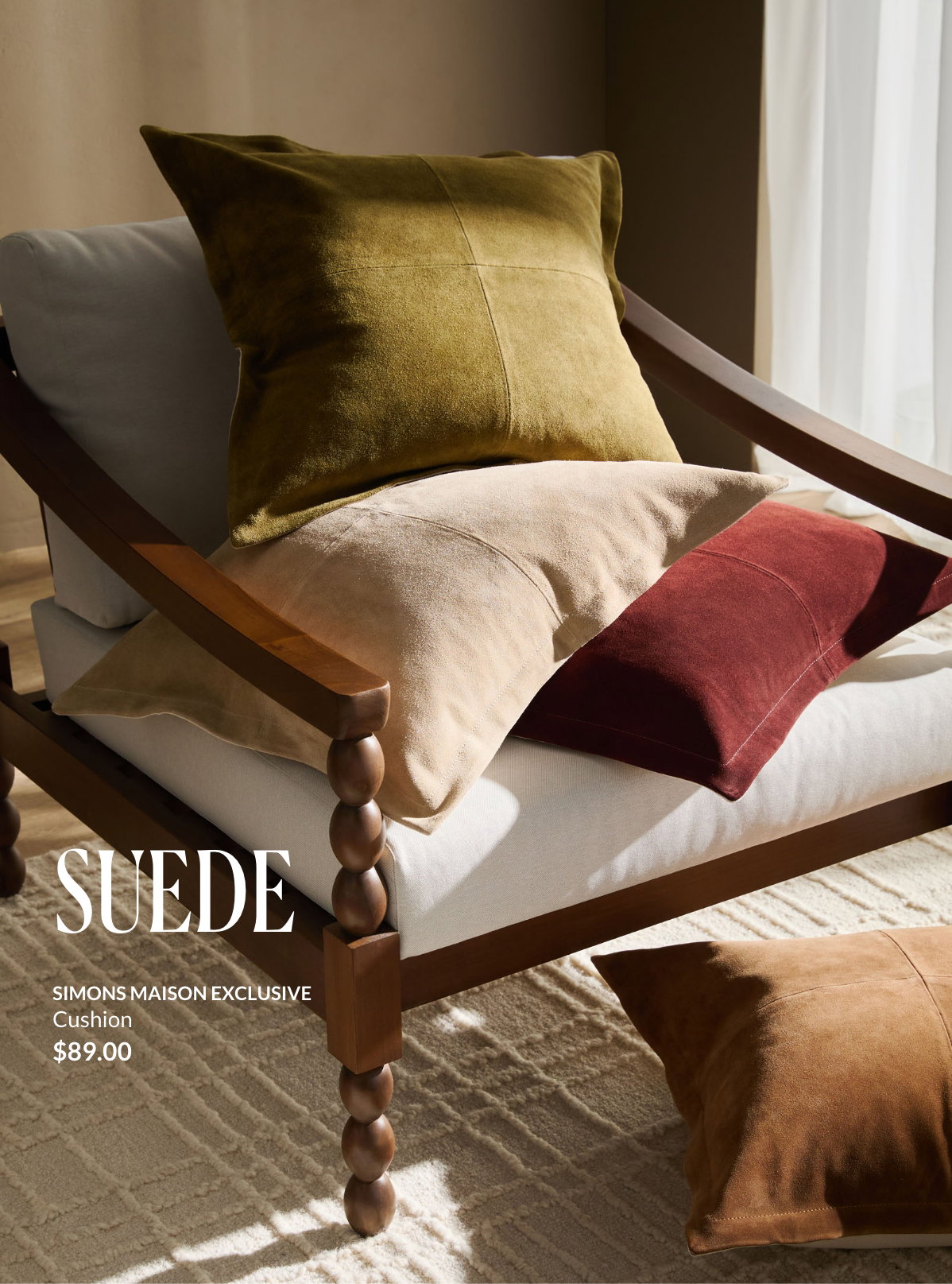 Several faux suede cushions with topstitching, priced at $89 each
