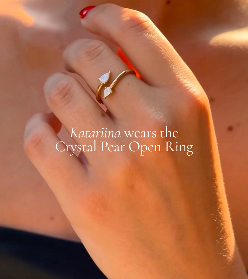 Katariina wears the Crystal Pear Open Ring