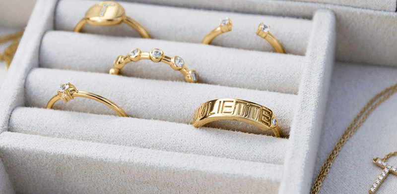 A jewelry box with an array of personalizable rings.