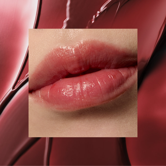 An image of the Kissu Lip Mask in Japanese Maple Red shown on a model's lips
