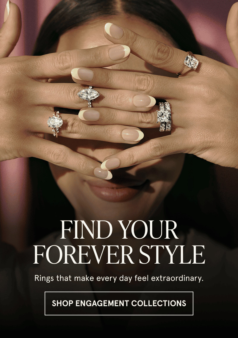 A model wearing several engagement rings. Find your forever style. Click here to shop engagement collections