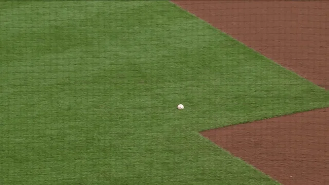 An animated gif of Ryan O'Hearn making a between-the-legs throw for an out