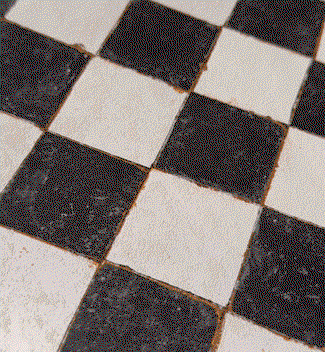 Gif image showing Tempaper's Vintage Check by Jeremiah Brent being installed as stair risers. 