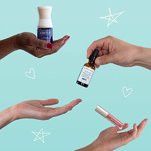 Hands passing makeup, skin care and hair care products to each other
