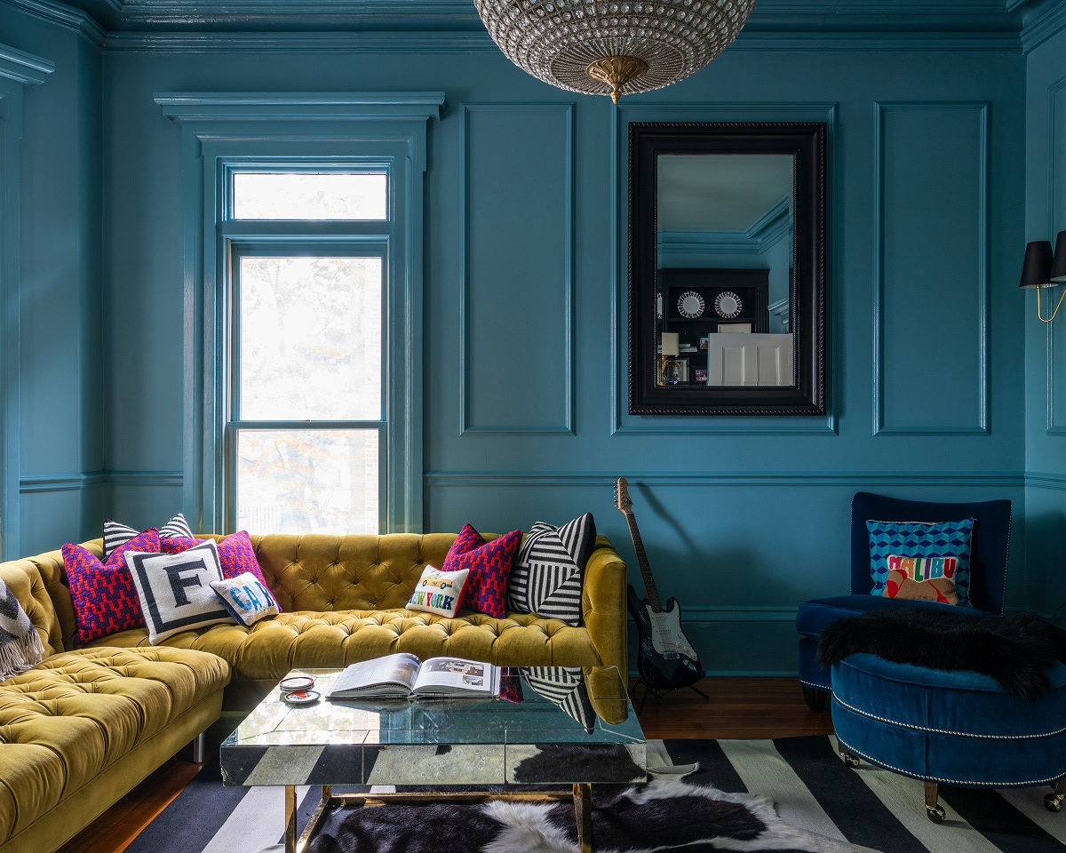 Room painted in Stone Blue, with walls and woodwork in the same muted blue shade creating a calm and immersive interior. 