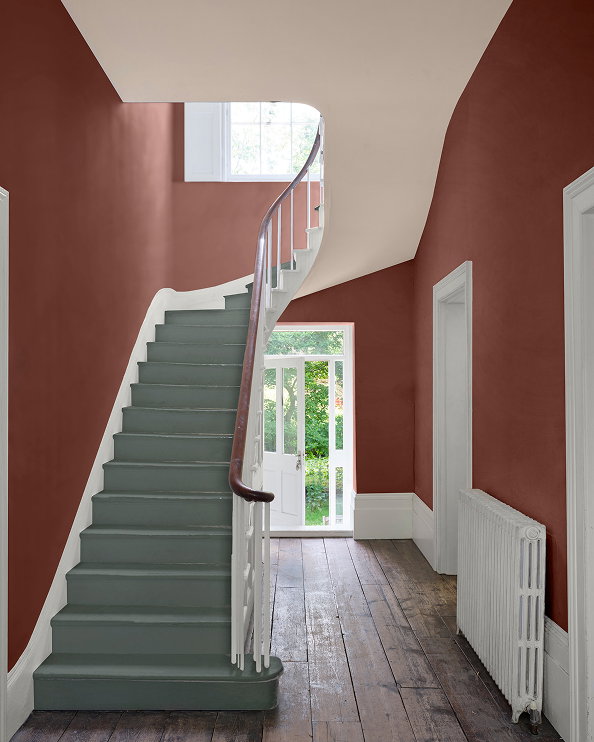 Room painted in rich Etruscan Red, showcasing deep red tones inspired by autumn leaves and seasonal warmth.