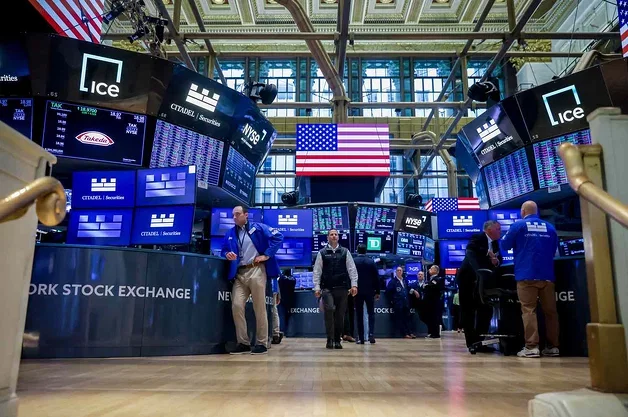 Nasdaq Hits Record High as Chip Stocks Extend Rally; Dow Falls