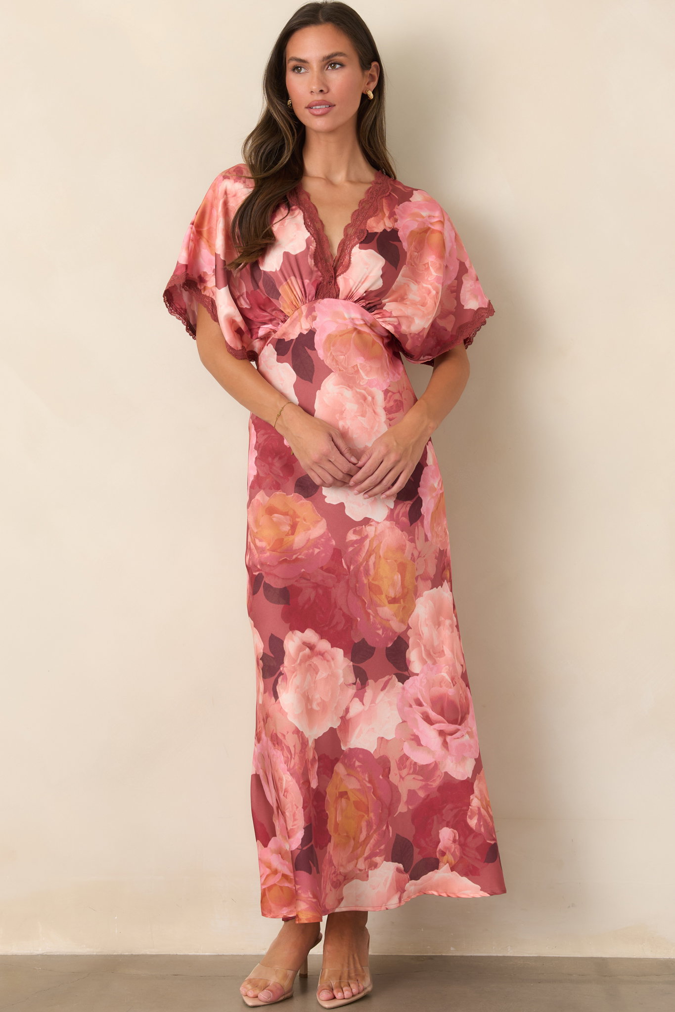 Model wearing a wine paisley long sleeve mini dress.