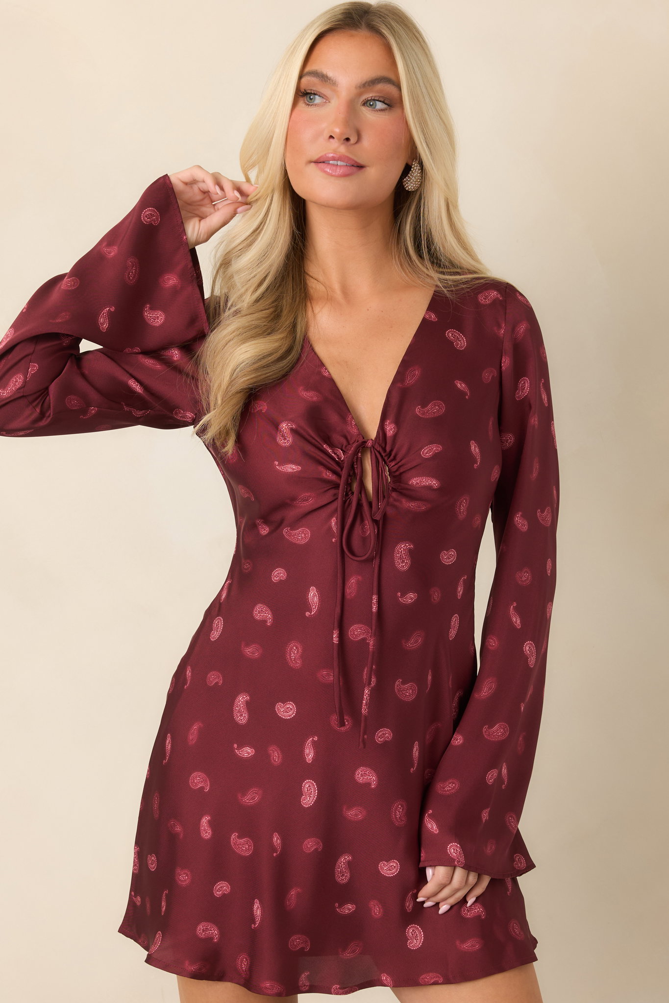 Model wearing a Wine Satin Paisley Long Sleeve Mini Dress.
