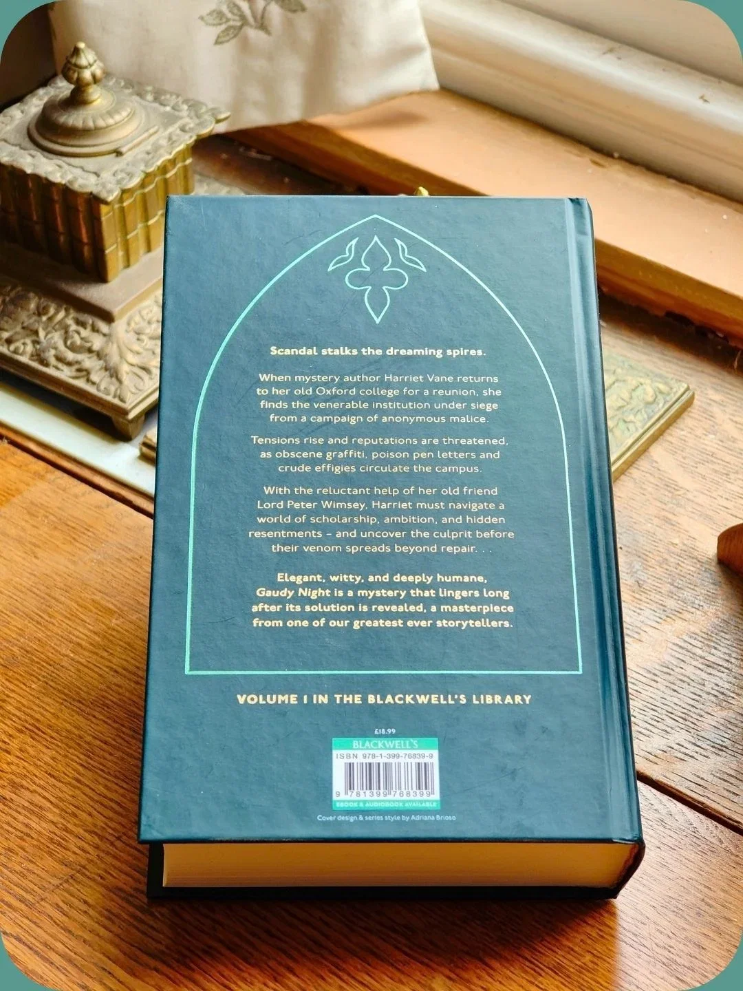 Back cover of a book with text description.