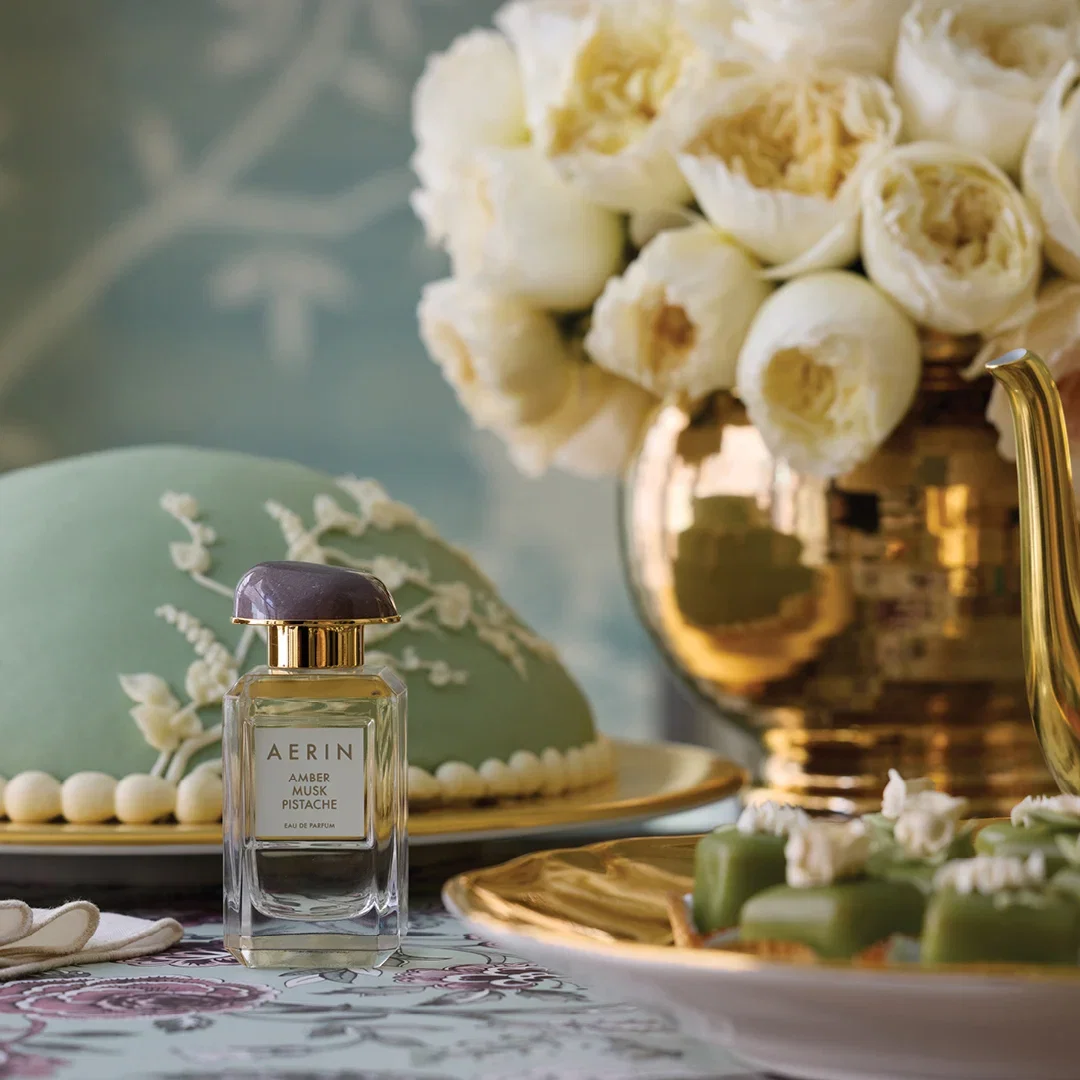 A GOURMAND INDULGENCE | New Amber Musk Pistache Eau de Parfum is inspired by the elegant charm of an artisanal pastry shop. | At its heart is a signature Pistachio Cream Accord that captures the richness of Pistachio with a subtle sweetness. Blended with notes of Vanilla, Amber, and soft Florals for a fragrance that feels indulgent and elegantly sweet. | SHOP NOW