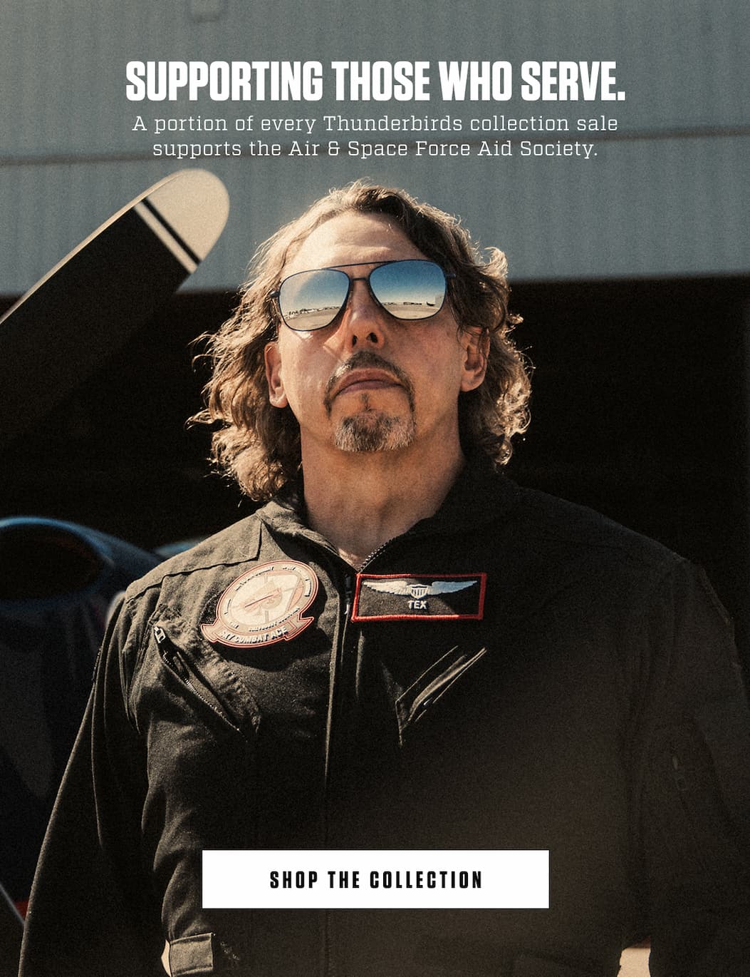 Man in a flight suit wearing mirrored Randolph aviator sunglasses beside an aircraft. A portion of every Thunderbirds collection sale supports the Air & Space Force Aid Society.
